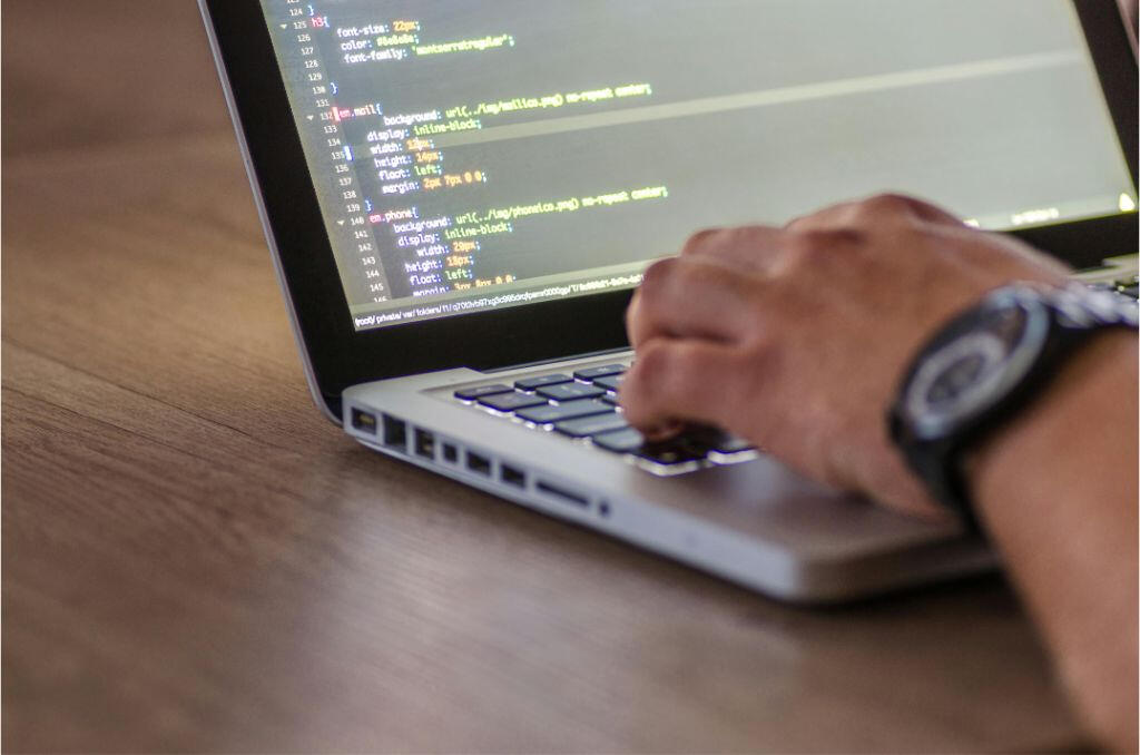 Building Bespoke Software for Your Unique Business Needs Interlocking gears representing custom-built software solutions or Creating tailored technology for business growth